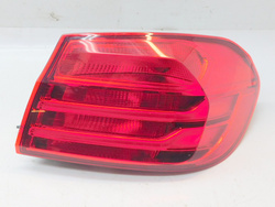 BMW 4 F32 2014r PRZEDLIFT LAMPA PRAWY TYŁ Z BŁOTNIKA USA 7296100