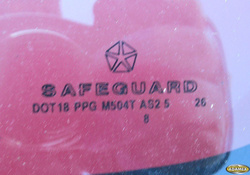 DODGE CARAVAN 95r SZYBA Z DRZWI ŚRODKOWYCH LEWYCH