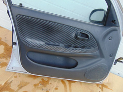 TOYOTA COROLLA E10 DRZWI LEWY PRZÓD ELE LIFTBACK