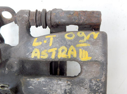 OPEL ASTRA H III  1.4 90KM 09r ZACISK HAMULCOWY LEWY TYŁ 