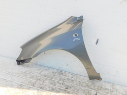 TOYOTA COROLLA E12 2.0 BŁOTNIK LEWY PRZÓD 1C3