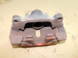 SKODA OCTAVIA II 05r ZACISK HAMULCOWY PRAWY PRZÓD