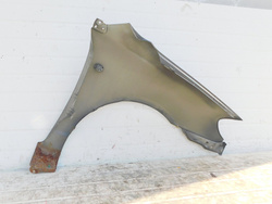 TOYOTA COROLLA E12 2.0 BŁOTNIK LEWY PRZÓD 1C3