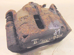 RENAULT MEGANE II 1.5 DCI 04r ZACISK LEWY PRZÓD