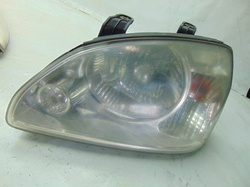 KIA CARENS II 03r LAMPA LEWY PRZÓD