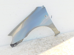 TOYOTA COROLLA E12 2.0 BŁOTNIK LEWY PRZÓD 1C3