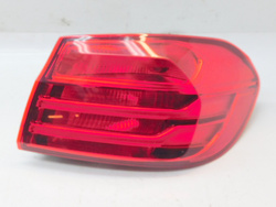 BMW 4 F32 2014r PRZEDLIFT LAMPA PRAWY TYŁ Z BŁOTNIKA USA 7296100