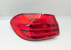 BMW 4 F32 2014r PRZEDLIFT LAMPA LEWY TYŁ Z BŁOTNIKA USA 7296099  